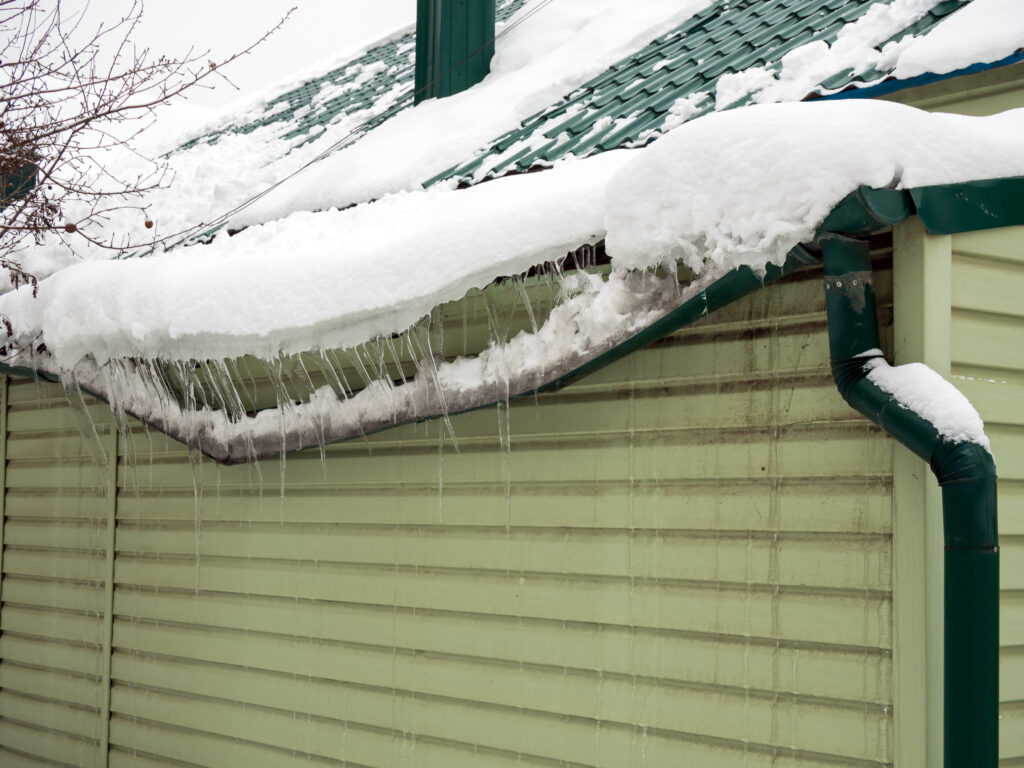 Drainage system destroyed by snow that slipped from the roof